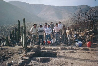 Upanca, 2002. Field crew behind area of site with archaic component.
