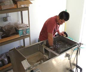 Former Undergrad Devin Snyder floating sediments from pit-hearths found in the Owens Valley.